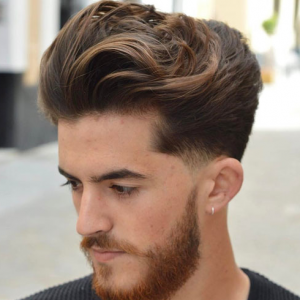 Long Brushed Back Hair Low Fade