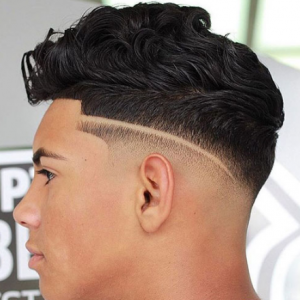 Low Skin Fade with Line Up and Wavy Quiff