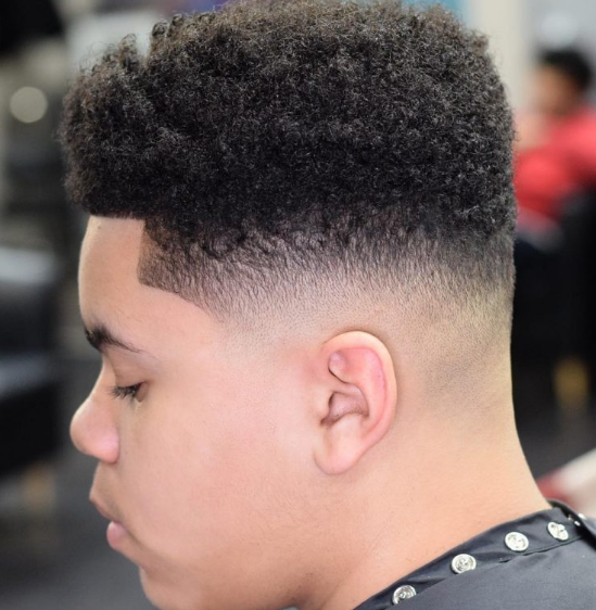 26. Curly High Top Fade 
